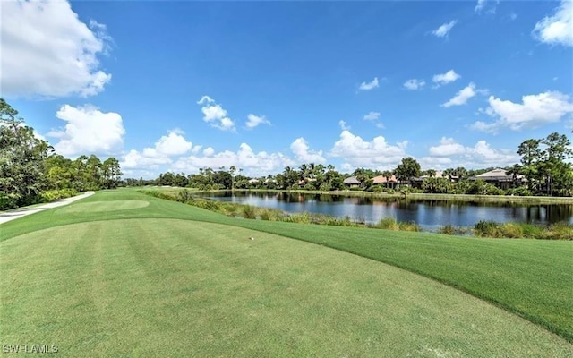 20250 Burnside Pl Unit 1502, Estero, FL 33928 - view of community featuring a water view and view of golf course