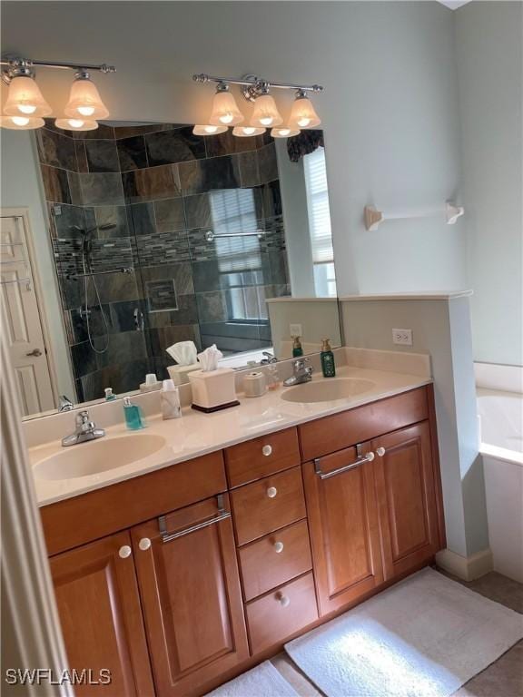 20250 Burnside Pl Unit 1502, Estero, FL 33928 - bathroom featuring double vanity, a stall shower, and a garden tub