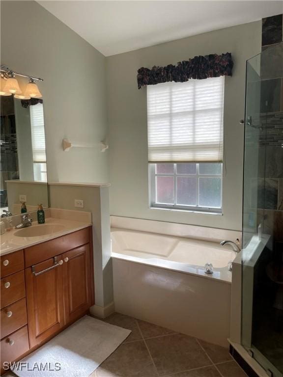 20250 Burnside Pl Unit 1502, Estero, FL 33928 - bathroom featuring a stall shower, vanity, a bath, and healthy amount of natural light