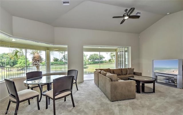 20250 Burnside Pl Unit 1502, Estero, FL 33928 - living room with lofted ceiling, light carpet, and ceiling fan