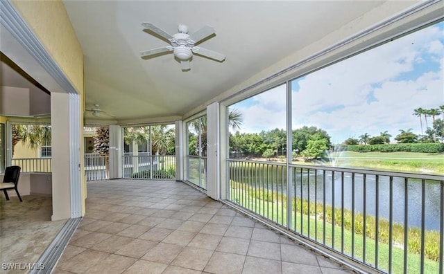 20250 Burnside Pl Unit 1502, Estero, FL 33928 - unfurnished sunroom with a ceiling fan, a water view, and lofted ceiling