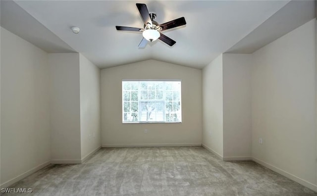 20250 Burnside Pl Unit 1502, Estero, FL 33928 - spare room with carpet flooring, ceiling fan, vaulted ceiling, and a smoke detector