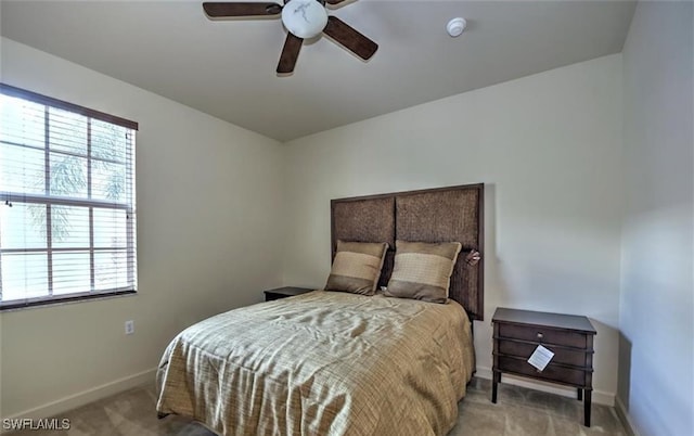 20250 Burnside Pl Unit 1502, Estero, FL 33928 - carpeted bedroom with baseboards and ceiling fan