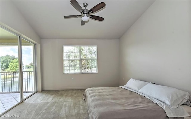 20250 Burnside Pl Unit 1502, Estero, FL 33928 - bedroom with access to exterior, lofted ceiling, multiple windows, carpet flooring, and ceiling fan
