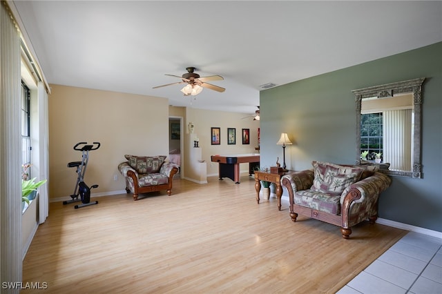 17139 Knight Dr, Fort Myers, FL 33967 - living room with light wood-style flooring, a ceiling fan, and billiards