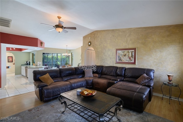 17139 Knight Dr, Fort Myers, FL 33967 - living room featuring light wood-type flooring, ceiling fan, a chandelier, and lofted ceiling