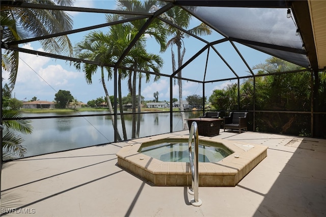 17139 Knight Dr, Fort Myers, FL 33967 - view of swimming pool featuring a patio area, an in-ground hot tub, a water view, and glass enclosure