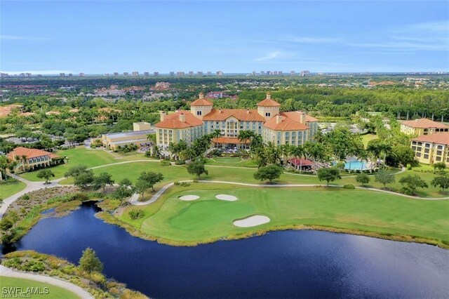 2738 Tiburon Blvd E Unit B406, Naples, FL 34109 - bird's eye view of a large body of water, city skyline, and a local golf course