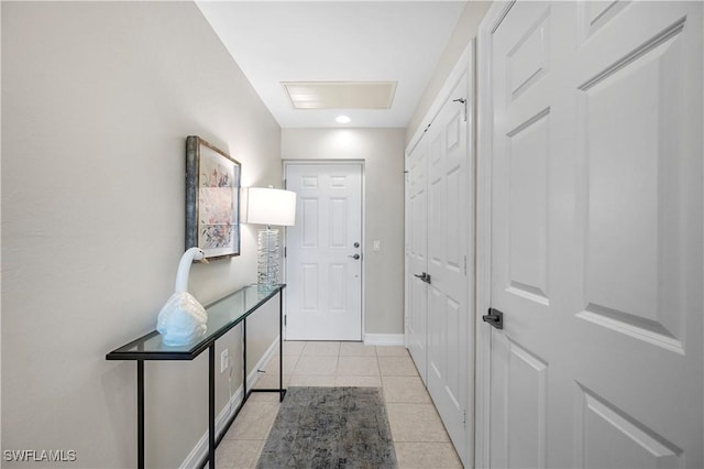 2738 Tiburon Blvd E Unit B406, Naples, FL 34109 - doorway to outside with light tile patterned flooring and recessed lighting