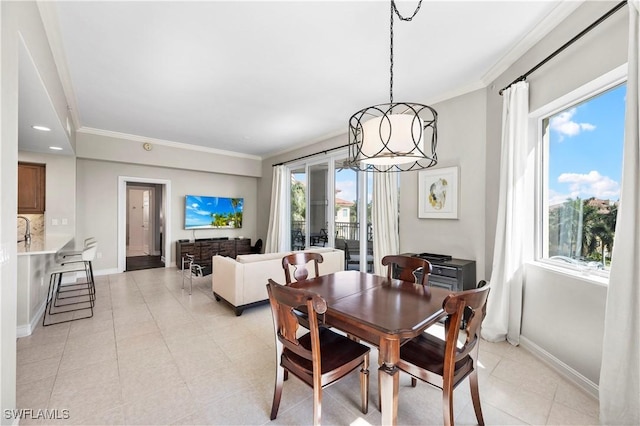 2738 Tiburon Blvd E Unit B406, Naples, FL 34109 - dining space with ornamental molding and light tile patterned flooring