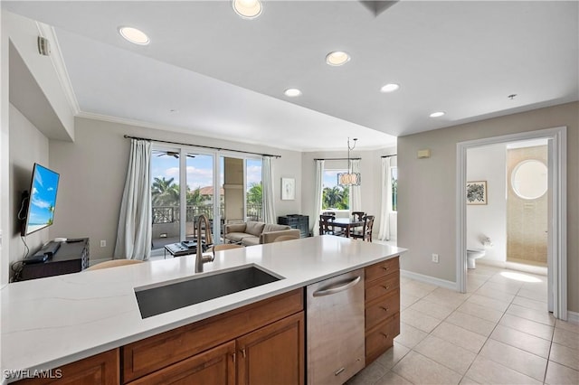 2738 Tiburon Blvd E Unit B406, Naples, FL 34109 - kitchen featuring stainless steel dishwasher, brown cabinets, open floor plan, light countertops, and recessed lighting