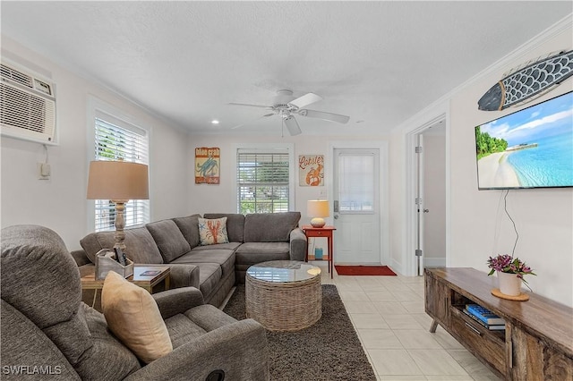 782 107th Ave N, Naples, FL 34108 - living area with healthy amount of natural light, ornamental molding, light tile patterned floors, ceiling fan, and a wall mounted air conditioner