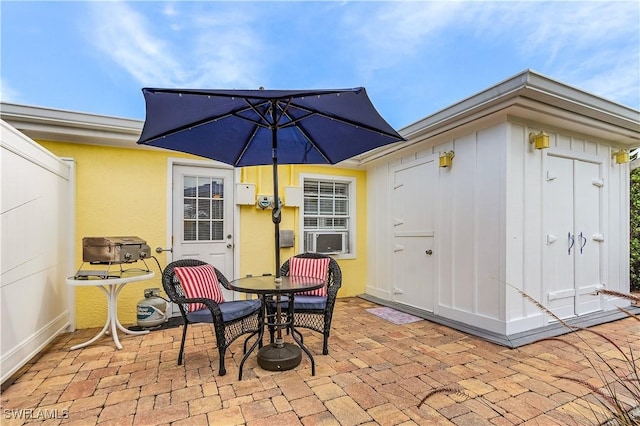 782 107th Ave N, Naples, FL 34108 - view of patio / terrace featuring cooling unit