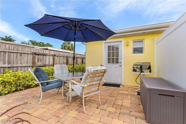 782 107th Ave N, Naples, FL 34108 - view of patio / terrace with outdoor dining space