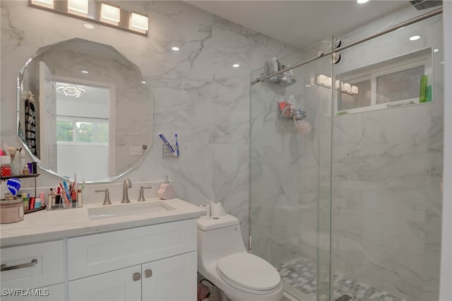 14539 Riverside Dr, Fort Myers, FL 33905 - full bathroom featuring vanity, a marble finish shower, and tile walls
