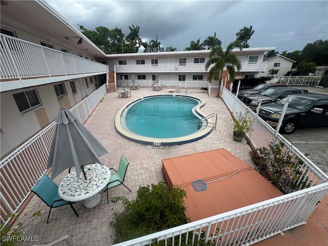 2590 1st St Unit 112, Fort Myers, FL 33901 - community pool featuring a patio area