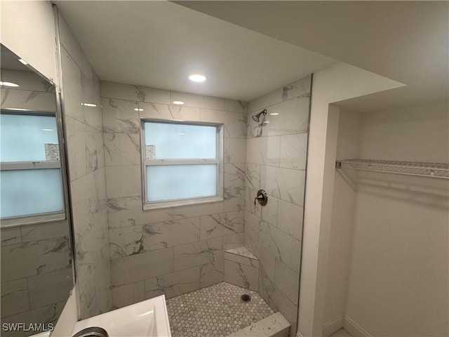 2590 1st St Unit 112, Fort Myers, FL 33901 - bathroom featuring tiled shower and recessed lighting