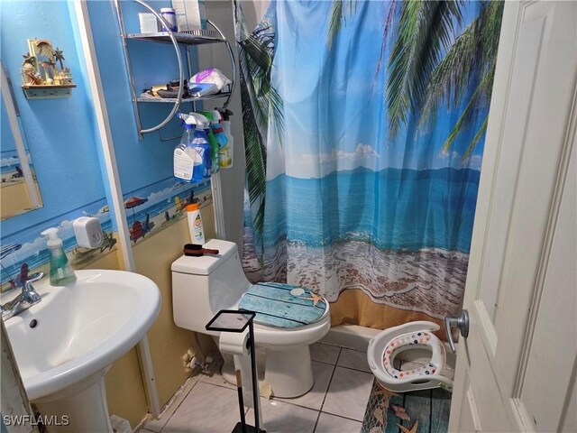 full bath with tile patterned flooring and curtained shower