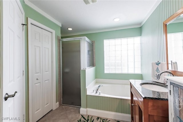 15139 Ligustrum Ln, Alva, FL 33920 - bathroom featuring vanity, a shower stall, a closet, a garden tub, and tile patterned floors