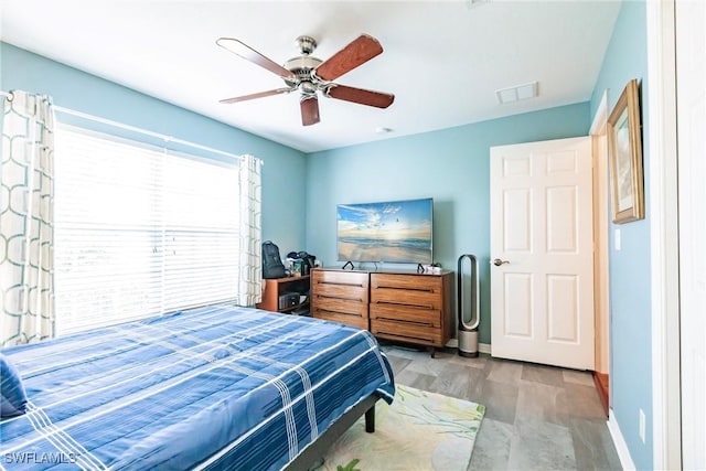 15139 Ligustrum Ln, Alva, FL 33920 - bedroom featuring a ceiling fan and wood finished floors