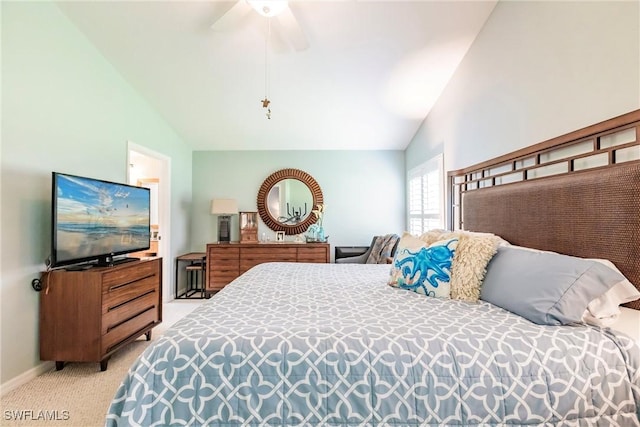 15139 Ligustrum Ln, Alva, FL 33920 - bedroom with vaulted ceiling, light colored carpet, and ceiling fan
