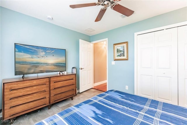 15139 Ligustrum Ln, Alva, FL 33920 - bedroom with a closet, light wood-type flooring, and a ceiling fan