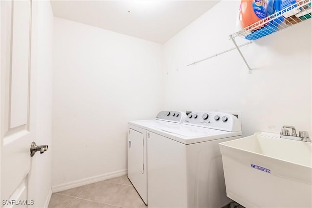 15139 Ligustrum Ln, Alva, FL 33920 - washroom with separate washer and dryer and light tile patterned floors