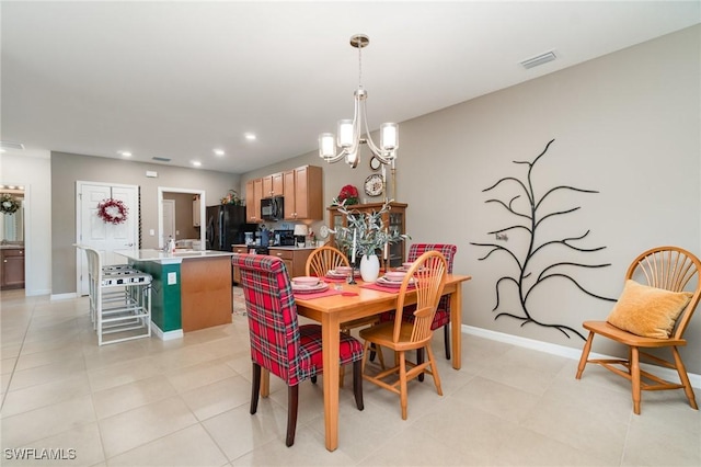 20095 Fiddlewood Ave, North Fort Myers, FL 33917 - dining area featuring a chandelier, recessed lighting, and light tile patterned floors
