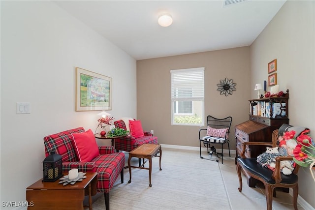 20095 Fiddlewood Ave, North Fort Myers, FL 33917 - sitting room with baseboards and light carpet