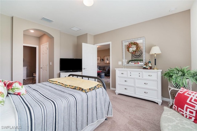 20095 Fiddlewood Ave, North Fort Myers, FL 33917 - bedroom with arched walkways and light colored carpet