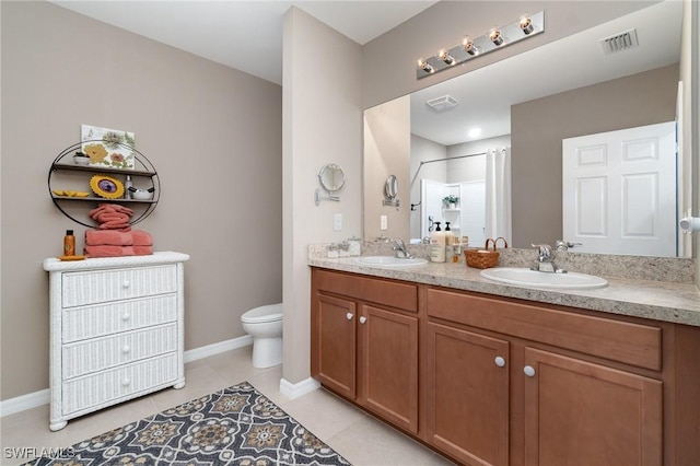 20095 Fiddlewood Ave, North Fort Myers, FL 33917 - full bathroom with double vanity, a shower, and tile patterned flooring