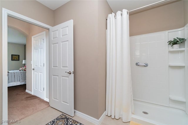 20095 Fiddlewood Ave, North Fort Myers, FL 33917 - full bathroom with a stall shower and baseboards