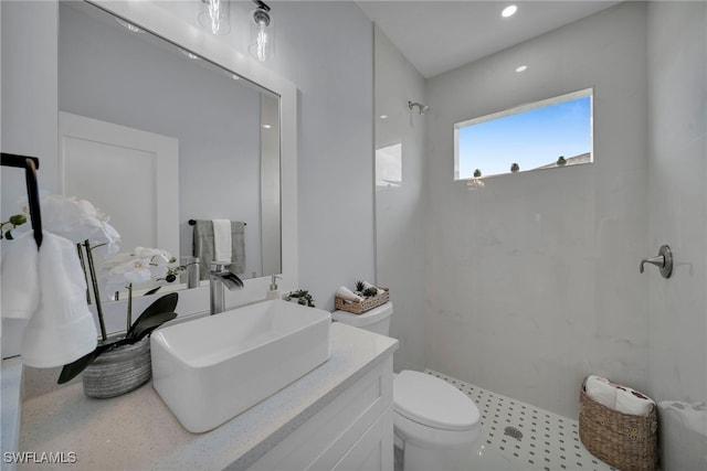 3706 16th St W, Lehigh Acres, FL 33971 - bathroom with a shower, vanity, and recessed lighting