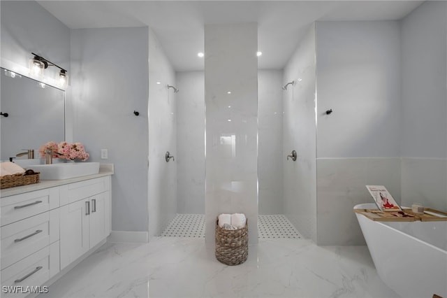 3706 16th St W, Lehigh Acres, FL 33971 - full bathroom featuring walk in shower, vanity, a soaking tub, recessed lighting, and marble finish floors