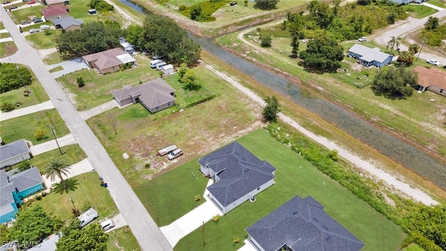 3706 16th St W, Lehigh Acres, FL 33971 - aerial view of property and surrounding area featuring nearby suburban area
