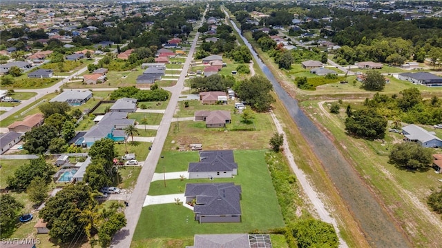 3706 16th St W, Lehigh Acres, FL 33971 - aerial view of property and surrounding area with nearby suburban area