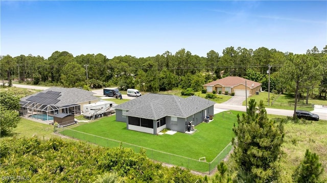902 E 10th St, Lehigh Acres, FL 33972 - view from above of property featuring a forest