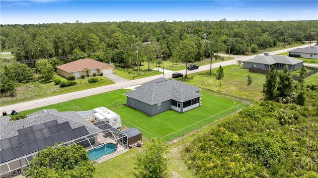 902 E 10th St, Lehigh Acres, FL 33972 - aerial view of property and surrounding area featuring a forest