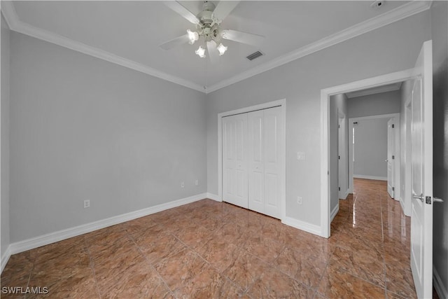 902 E 10th St, Lehigh Acres, FL 33972 - unfurnished bedroom with crown molding, a closet, and ceiling fan