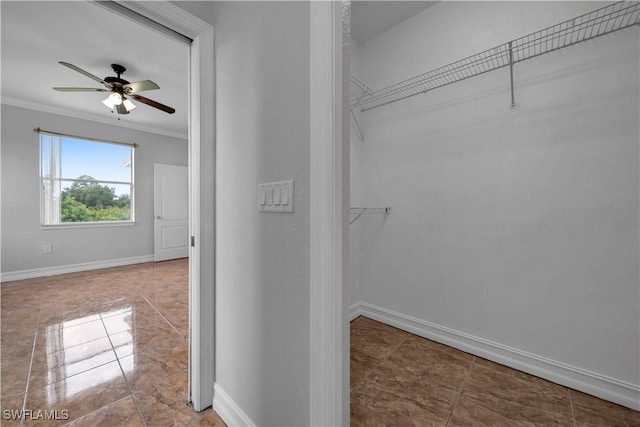 902 E 10th St, Lehigh Acres, FL 33972 - walk in closet featuring ceiling fan and tile patterned flooring