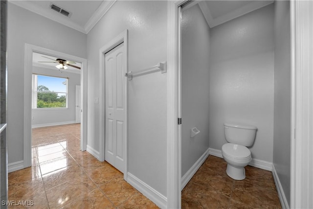 902 E 10th St, Lehigh Acres, FL 33972 - bathroom featuring crown molding and ceiling fan