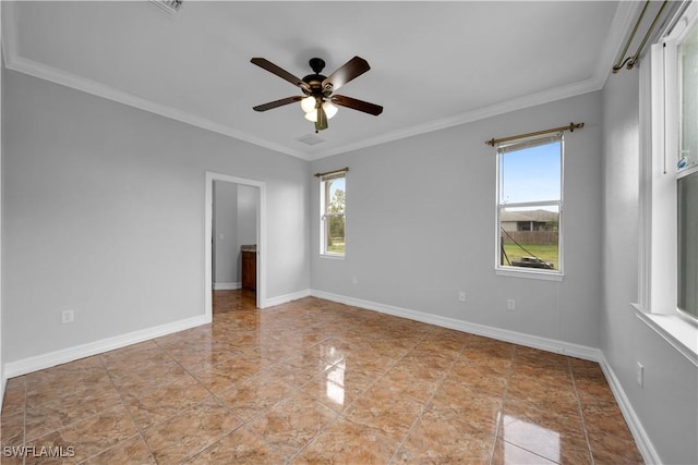 902 E 10th St, Lehigh Acres, FL 33972 - spare room with a ceiling fan and ornamental molding