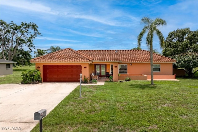 1422 Archer St, Lehigh Acres, FL 33936 - ranch-style house featuring a tiled roof, french doors, a garage, and concrete driveway