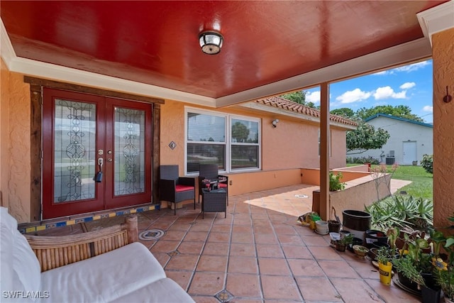 1422 Archer St, Lehigh Acres, FL 33936 - view of patio / terrace featuring french doors
