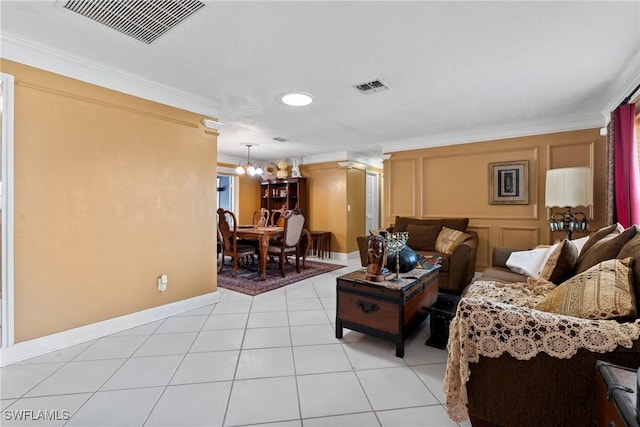 1422 Archer St, Lehigh Acres, FL 33936 - living room with crown molding, light tile patterned floors, and a chandelier