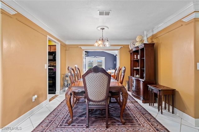 1422 Archer St, Lehigh Acres, FL 33936 - dining room with a chandelier, ornamental molding, and light tile patterned flooring