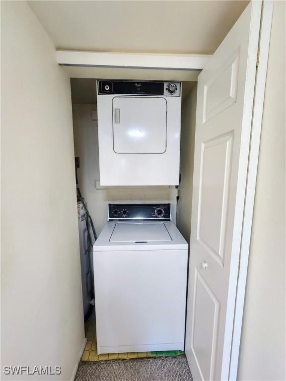 1221 Barrett Rd Unit 905, North Fort Myers, FL 33903 - washroom with estacked washer and dryer