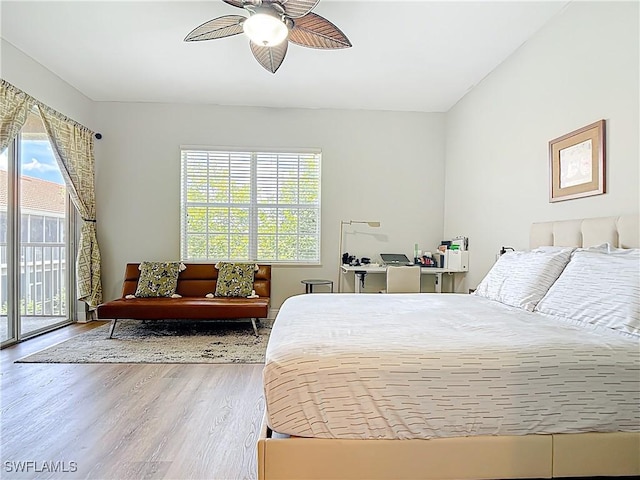14031 W Hyde Park Dr Unit 201, Fort Myers, FL 33912 - bedroom featuring access to outside, wood finished floors, and ceiling fan
