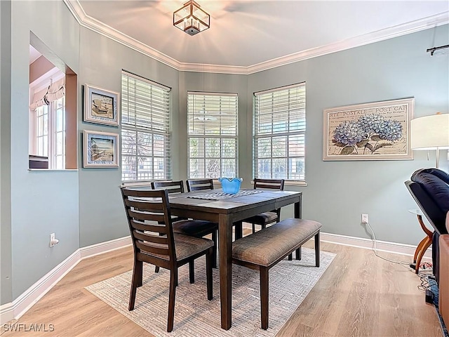 14031 W Hyde Park Dr Unit 201, Fort Myers, FL 33912 - dining area with light wood-type flooring and crown molding