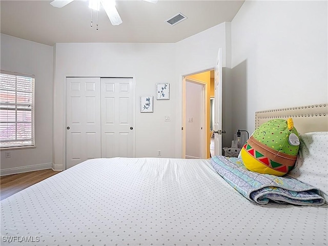 14031 W Hyde Park Dr Unit 201, Fort Myers, FL 33912 - bedroom featuring wood finished floors, a closet, and a ceiling fan
